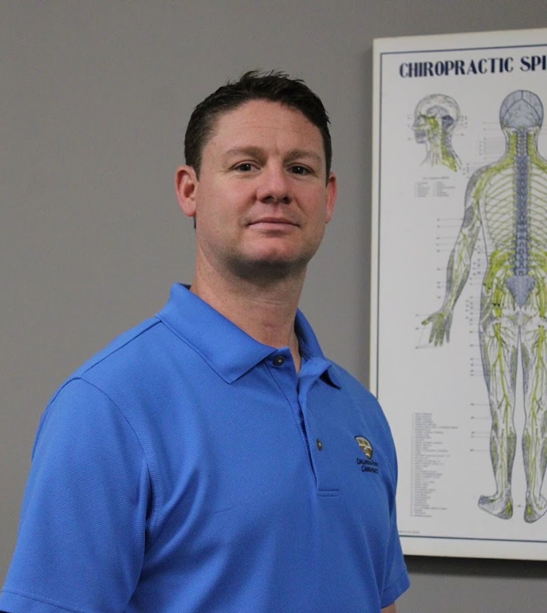 Dr. Joseph Orlandini performing chiropractic adjustment